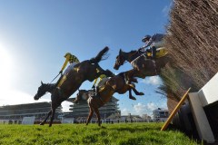 AL BOUM PHOTO (NEAR) LANDS OVER THE LAST FENCE WITH LOSTINTRANSLATION (8) AND SANTINI (RIGHT) ON WAY TO WINNING GOLD CUP.CHELTENHAM 13-3-20.Photo © George Selwyn +44 (0)7967 030722116 Wellington Parade Kent UK CT14 8AF.