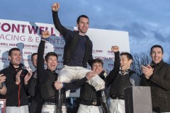 LEIGHTON ASPELL IS LIFTED ALOFT BY WEIGHING ROOM COLLEAGUES AFTER THE JOCKEY FINISHED SECOND ON HIS FINAL RIDE OF CAREER IN LAST RACE OF DAY.FONTWELL 23-2-20.Photo © George Selwyn +44 (0)7967 030722116 Wellington Parade Kent UK CT14 8AF.