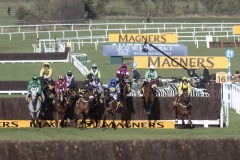 FIRST FENCE GOLD CUP.EVENTUAL WINNER, AL BOUM PHOTO IS JUMPING SECOND FROM LEFT.CHELTENHAM 13-3-20.Photo © George Selwyn +44 (0)7967 030722116 Wellington Parade Kent UK CT14 8AF.