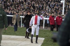 JAMIE MOORE ABOUT TO BE “ATTACKED” BY ALICE PLUNKETT AFTER GOSHEN AND JAMIE MOORE CRASH OUT AT FINAL FLIGHT WITH RACE AT THEIR MERCY.CHELTENHAM 13-3-20.Photo © George Selwyn +44 (0)7967 030722116 Wellington Parade Kent UK CT14 8AF.