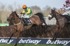 ITCHY FEET (RIGHT) JUMPS THE LAST FENCE WITH MIDNIGHT SHADOW ON THE WAY TO WINNING THE SCILLY ISLES NOVICES CHASE.SANDOWN 1-2-20.Photo © George Selwyn +44 (0)7967 030722116 Wellington Parade Kent UK CT14 8AF.