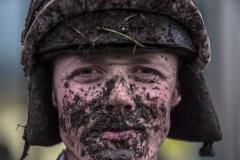 A MUD SPATTERED CONDITIONAL JOCKEY CILLIN LEONARD RETURNES TO THE WEIGHING ROOM AFTER FINISHING DOWN THE FIELD IN 6TH RACE.ASCOT 15-2-20.Photo © George Selwyn +44 (0)7967 030722116 Wellington Parade Kent UK CT14 8AF.