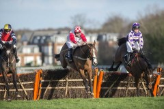LIMITED RESERVE (LEFT) JUMPS LAST FLIGHT WITH GO WHATEVER AND THE BLUNDERING, DAN McGRUE (RIGHT) ON WAY TO WINNING.SANDOWN 1-2-20.Photo © George Selwyn +44 (0)7967 030722116 Wellington Parade Kent UK CT14 8AF.