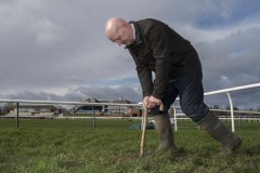 JIMMY STEVENSON CLERK OF THE COURSE INSPECTS THE WATERLOGGED TRACK.LEICESTER RACEOURSE 25-2-20.©George Selwyn  07967 030722 email: george@georgeselwyn.co.uk Vat no:3308110 05