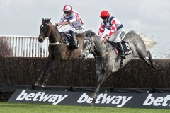 WHO DARES WINS (LEFT) JUMPS THE LAST FENCE WITH SOUTHFIELD STONE ON WAYTO WINNING THE PENDIL NOVICES CHASE.22-2-20.Photo © George Selwyn +44 (0)7967 030722116 Wellington Parade Kent UK CT14 8AF.