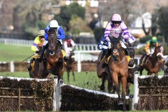 Iceo & Harry Cobden (right) jump last flight with Knickerbockerglory on way to winning.Sandown 11-3-23.Photo © George Selwyn +44 (0)7967 030722116 Wellington Parade Kent UK CT14 8AF.